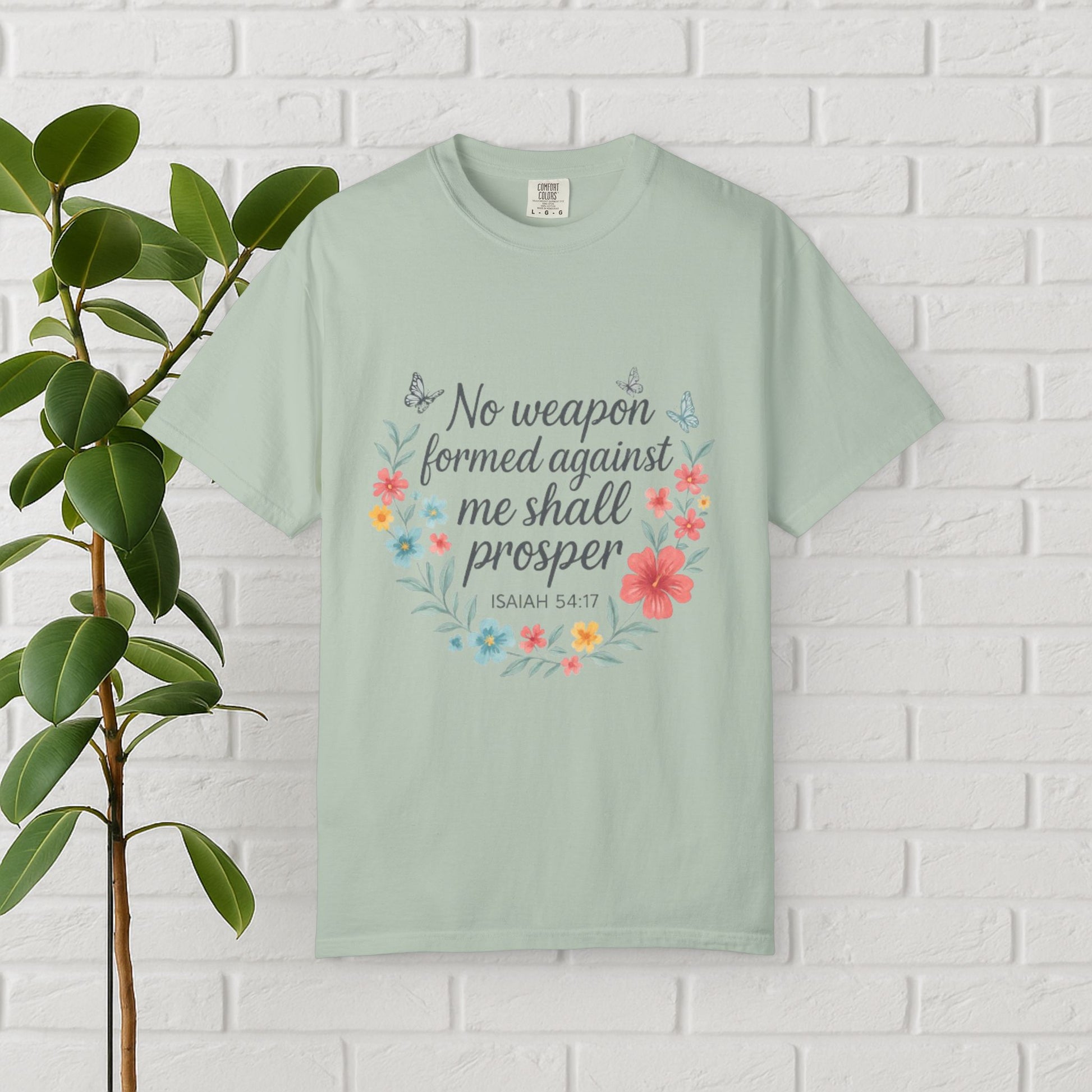 No Weapon Shall Prosper Tee – Isaiah 54:17 Floral Shield