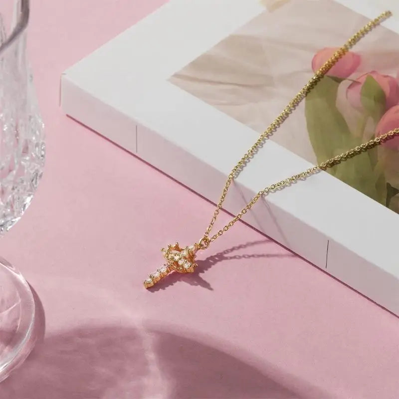 Crowned in Grace – Cross & Crown Pendant Necklace
